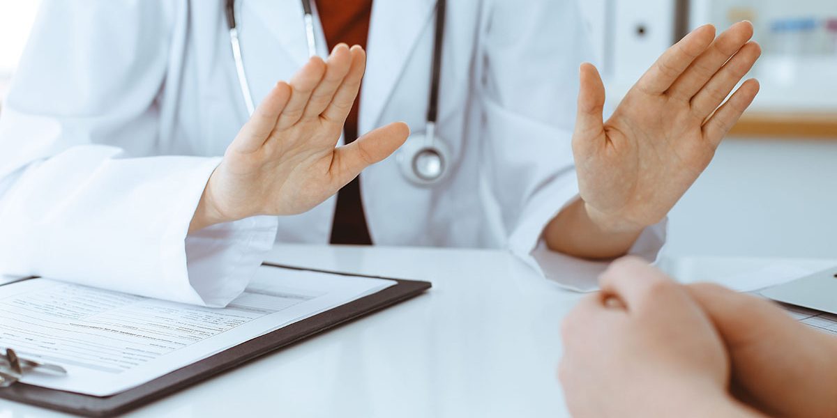 woman-doctor and patient discussing something