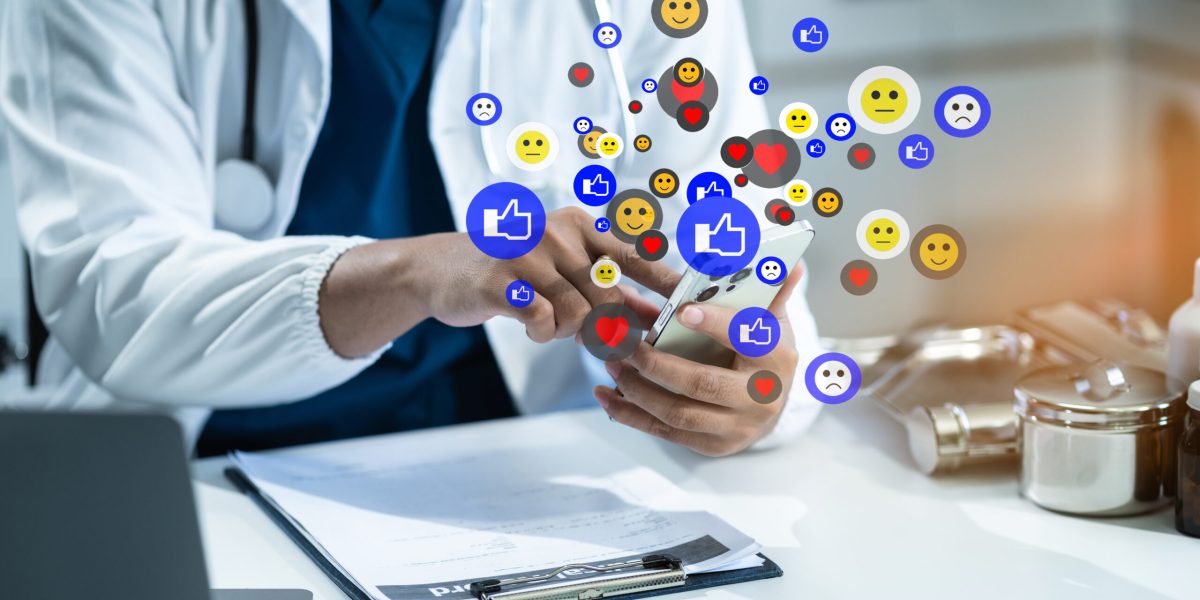 doctor are using smartphonet to Social media at morning light.